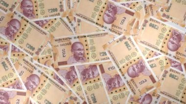 200 Indian rupees money composition. Financial background. Many banknotes and wads of money. Business or economy concept. Cash.