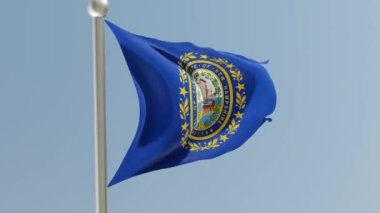 New Hampshire flag on flagpole. NH flag fluttering in the wind. USA.