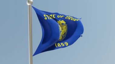Oregon flag on flagpole. OR flag fluttering in the wind. USA.