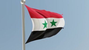 Bayrak direğinde Suriye bayrağı. Suriye bayrağı rüzgarda dalgalanıyor.