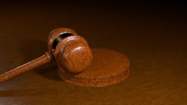 Judges gavel. Chairmans gavel. Sentencing video. Gavel knocking on the stand in court.
