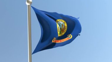Idaho flag on flagpole. ID flag fluttering in the wind. USA.