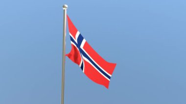 Bayrak direğinde Norveç bayrağı. Norveç bayrağı rüzgarda dalgalanıyor.