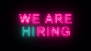 Colorful neon inscription we are hiring on transparent background. Alpha channel.