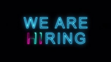 Colorful neon inscription we are hiring on transparent background. Alpha channel.