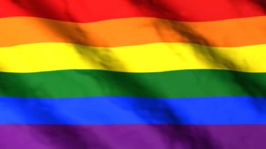 Rüzgarda dalgalanan gökkuşağı bayrağı. LGBT sembolü. Gurur bayrağı.