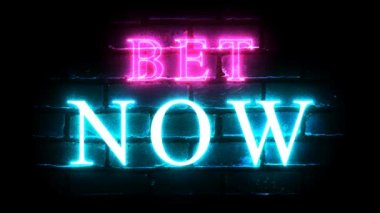 Bet Now glowing neon inscription on brick wall background. Betting concept.