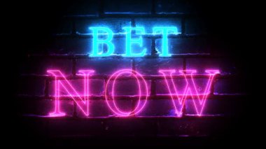 Bet Now glowing neon inscription on brick wall background. Betting concept.