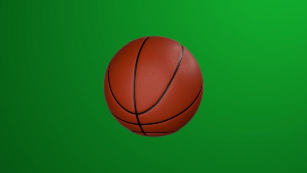 Классический Баскетбольный Мяч Вращается Зеленом Фоне Ключ Хрома — стоковое видео