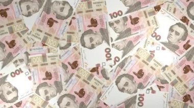 100 Ukrainian hryvnia money composition. Financial background. Many banknotes and wads of money. Business or economy concept. Cash.