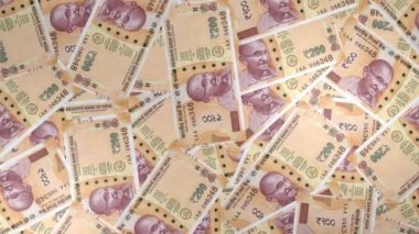 200 Indian rupees money composition. Financial background. Many banknotes and wads of money. Business or economy concept. Cash.