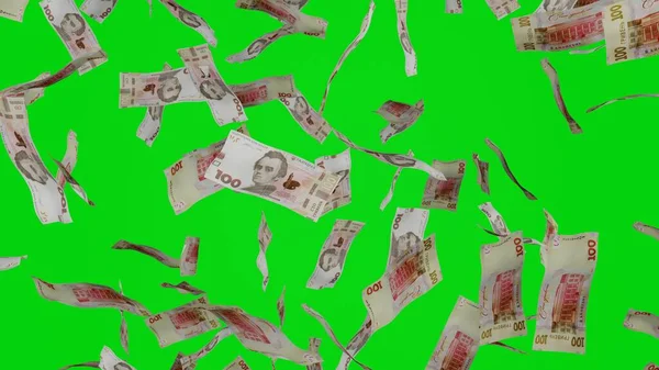 多くの銀行券がクロマキーの背景に落ちています ウクライナの銀行券100枚 金の塊だ 金融とビジネスの概念 緑の画面 — ストック写真