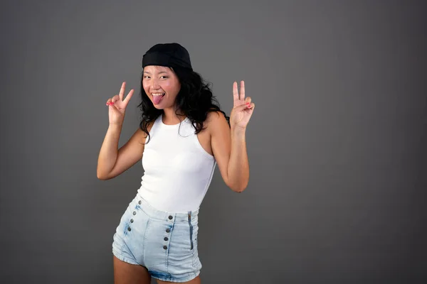 Young Chinese Girl Bandana Shorts Making Victory Sign Funny Pose — 스톡 사진