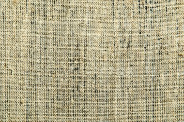 koyu yaratıcı arkaplan: siyah astarlı keten tuvalin ters tarafı, düz olmayan ışıklandırma, renk tonlama 