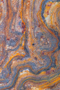 grunge arkaplan: eski metal bir yüzey üzerindeki kıvrımlı pas, tonlama 