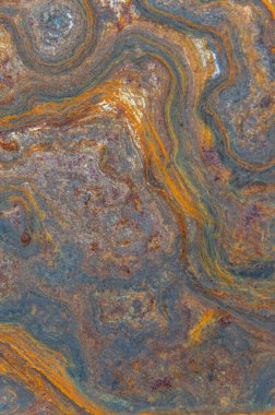 grunge arkaplan: eski metal bir yüzey üzerindeki kıvrımlı pas, tonlama 