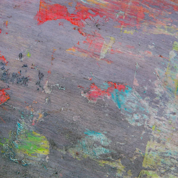 カラフルな創造的なモトリーの背景 木製パレット上の油絵具のぬかるんだ残留物 短い焦点 選択的なぼかし — ストック写真
