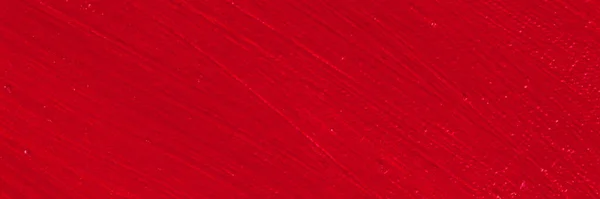 Parlak Kırmızı Arkaplan Düz Bir Yüzey Üzerindeki Kalın Akrilik Boya — Stok fotoğraf