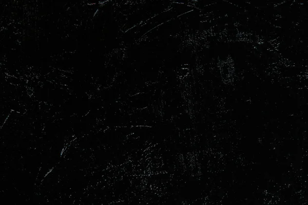 Karanlık yaratıcı arka plan, pürüzlü keten branda siyah astar ile örtülü, ışığın yansımaları. Tonlama, bulanıklaştırma, seçici odaklanma. 