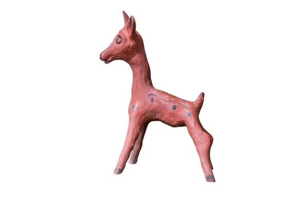 用木头雕成的丑陋的小鹿雕像 图库照片