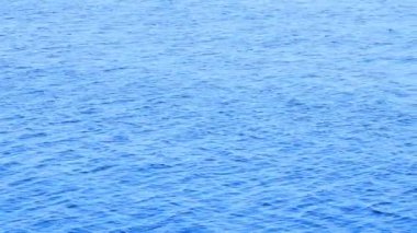 Mavi sakinleştirici dalga dokusu. Deniz arka planı. Göl kapalı..