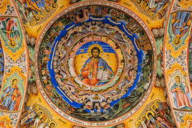Duvarda manastır resmi var. İsa, dünyanın yaratılışı
