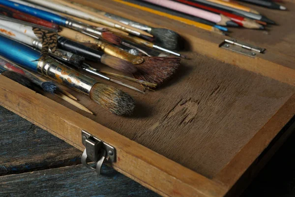 Brushes Colored Pencils Box Aged Wooden Countertop — Stock Photo, Image