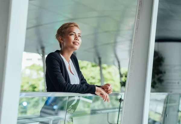 Happy Business Woman Thinking Outside Office