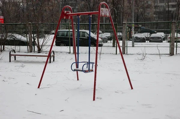 Playground Snow Covered City Swing Bench Fence Cars Houses Fence — Stockfoto