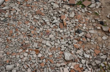 abstract background: gravel and pieces of broken tiles