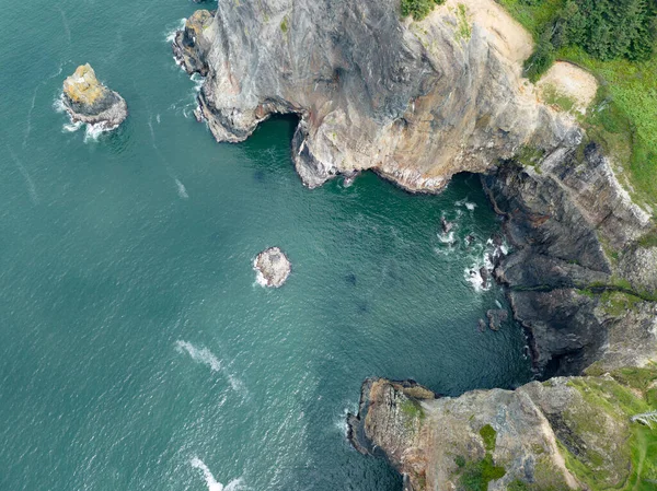 The Northern Oregon shoreline, not far west of Portland, is continually eroded by the Pacific Ocean. This part of the Pacific Northwest is full of scenic forests and impressive coastlines.