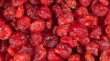 Arka planda birçok kurumuş kiraz - dönen ve döngü videosu