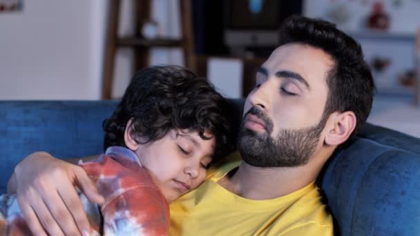 Caring Indian Father Casual Clothes Patting His Adorable Son Sleep — Stock Video