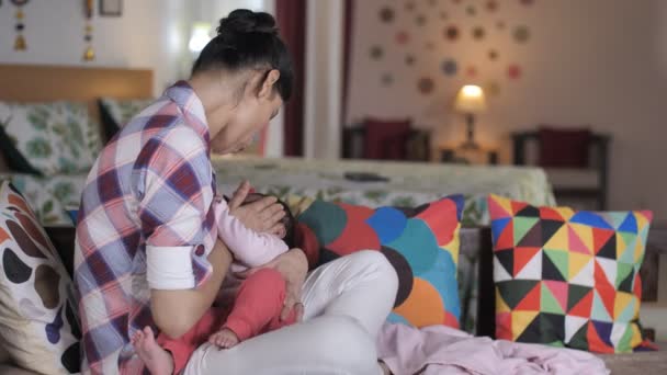 Loving Indian Mother Breastfeeding Her Little Daughter Home Newborn Baby — стоковое видео