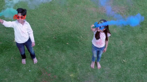 Young School Kids Playing Colorful Blue Smoke Sticks While Celebrating — Stock Video