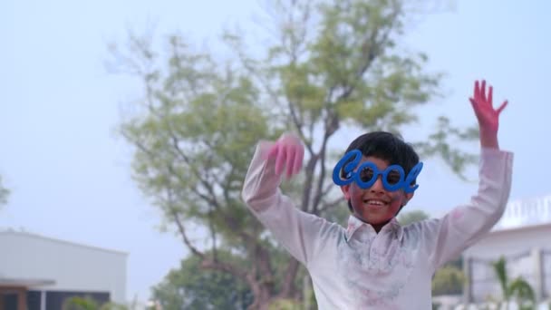 Sweet Boy Wearing Cool Sunglasses Posing Camera Public Park Holi — Stock Video