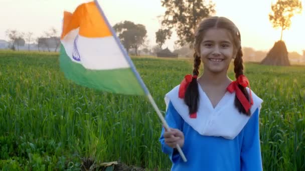 Little Schoolgirl Proudly Swinging Indian National Her Farm Field Patriotism — Stock Video