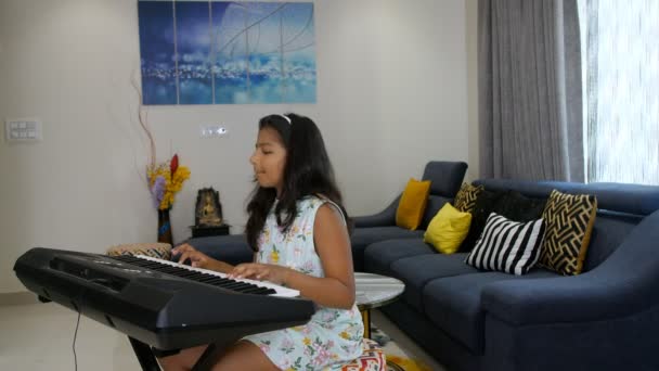 Young Schoolgirl Long Hair Playing Piano Keyboard Her Living Room — ストック動画