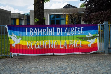 Lombardia, Italy - 05.01.2022: Rainbow flag with Italian text 