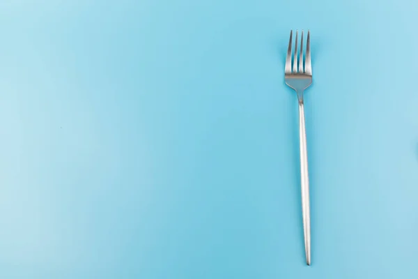 Fourchette Acier Sur Fond Bleu Concept Salle Manger Ustensiles Cuisine — Photo