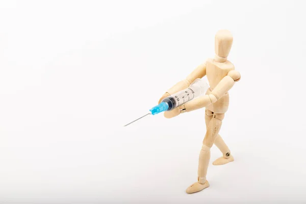 Wooden Mannequin Syringe White Background Coronavirus Vaccination Space Text — Stock Photo, Image