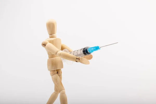 Wooden Mannequin Syringe White Background Coronavirus Vaccination Space Text — Stock Photo, Image