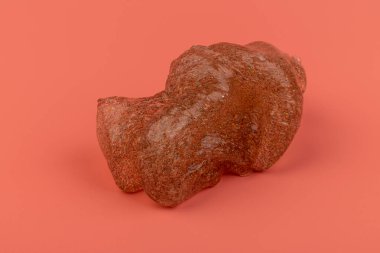 Pembe arka planda parlak balçık. Şeffaf oyuncak. Pembe kız renkleriyle parıltılı desen.