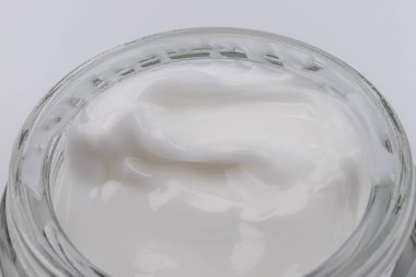 Krema arka planı. Kozmetik. Krem beyaz arkaplan dokusu.