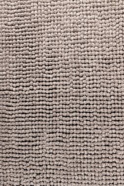 Gri kadife yumuşak banyo paspası dokusu. Banyo aksesuarları. Kapat..