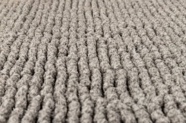 Gri kadife yumuşak banyo paspası dokusu. Banyo aksesuarları. Kapat..