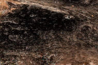 Soyut desenli, içi kabarcıklı şeffaf balçık. Çocuk oyuncağı sümüğü..