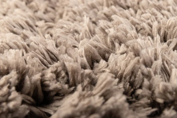 Gray chenille soft bath mat texture background. Bath Accessories. Close up.