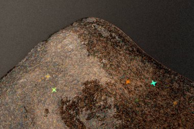 Soyut desenli, içi kabarcıklı şeffaf balçık. Çocuk oyuncağı sümüğü..