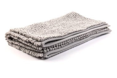 Gri kadife yumuşak banyo paspası dokusu. Banyo aksesuarları. Kapat..